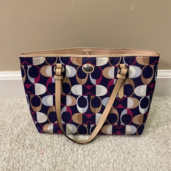 Coach Handbags - Coach Plum and Tan Logo Purse